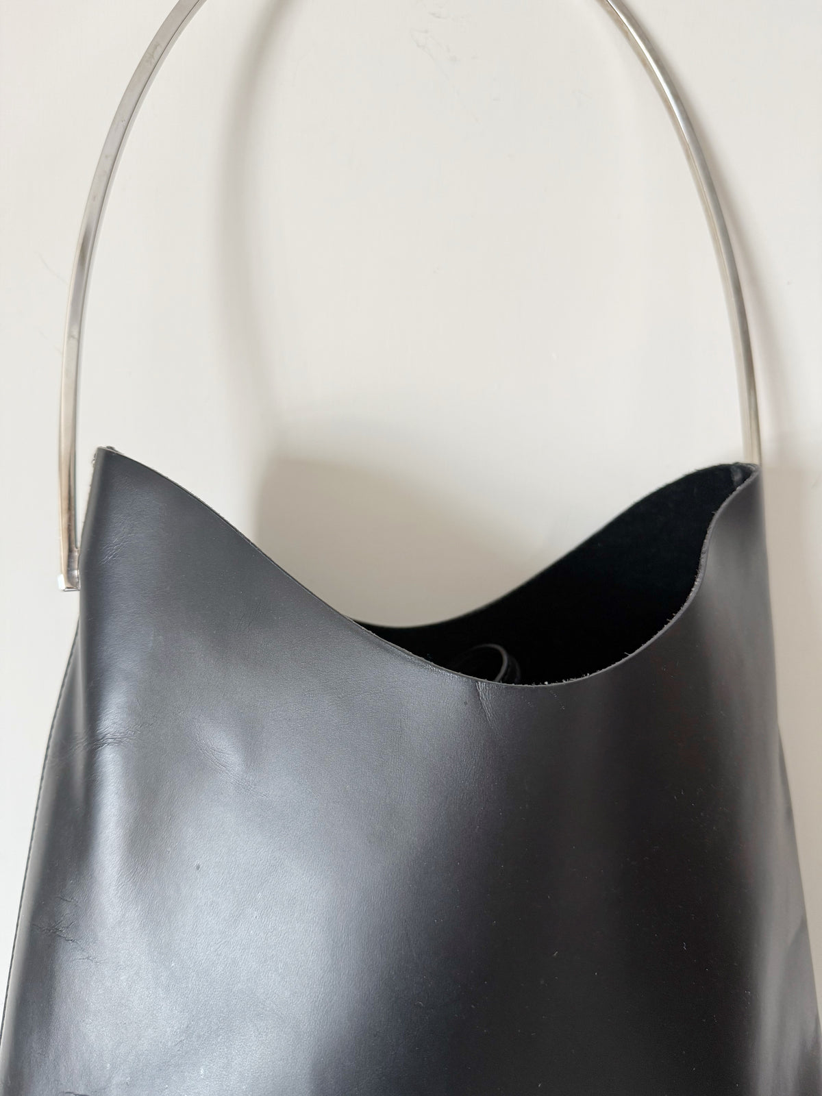03. Gucci leather bag with metal handle