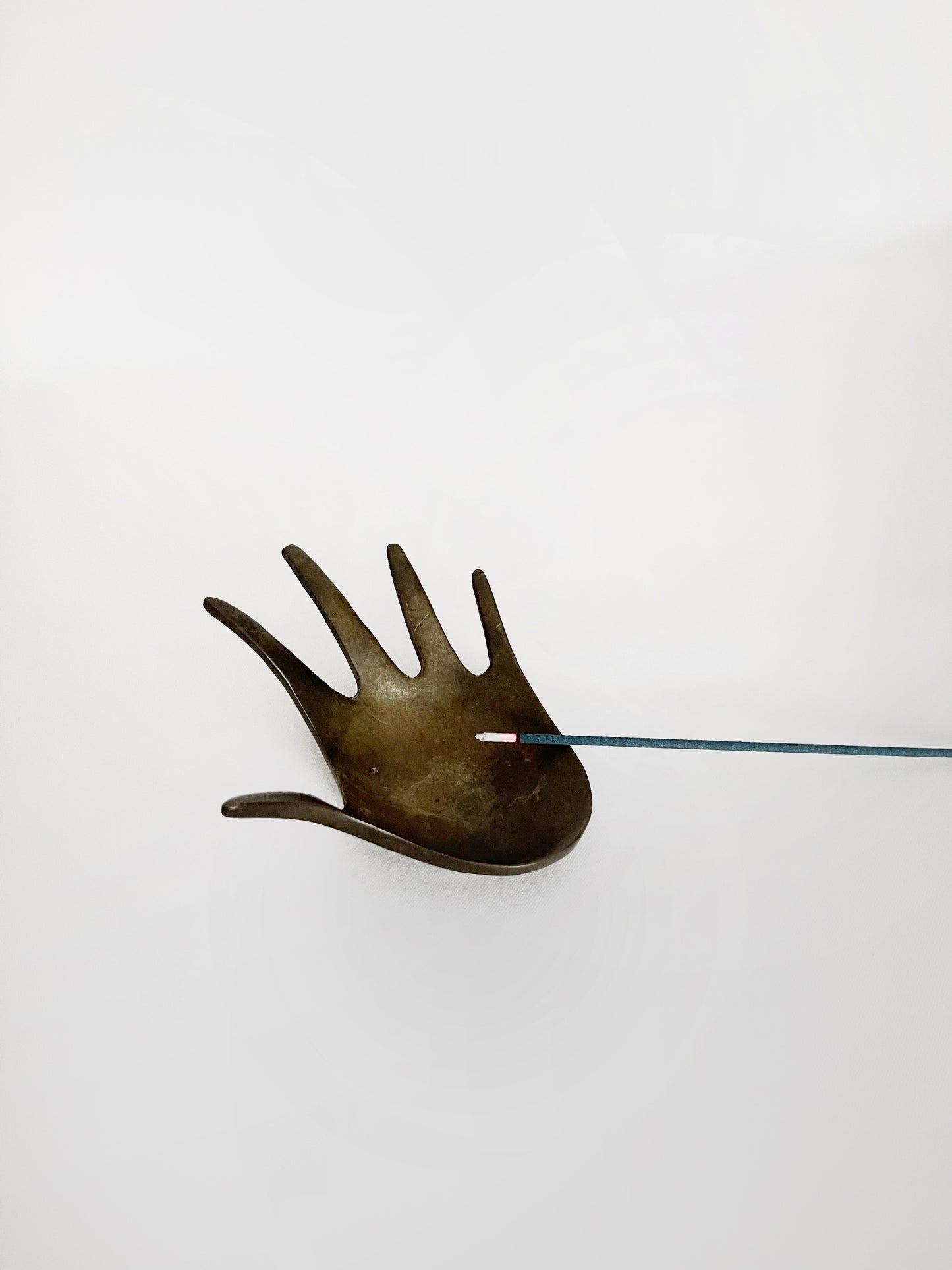 Brass hand shaped ashtray