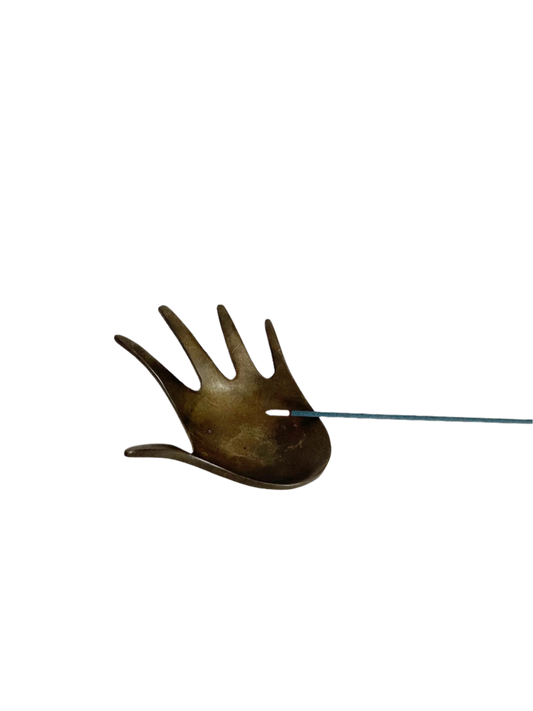Brass hand shaped ashtray