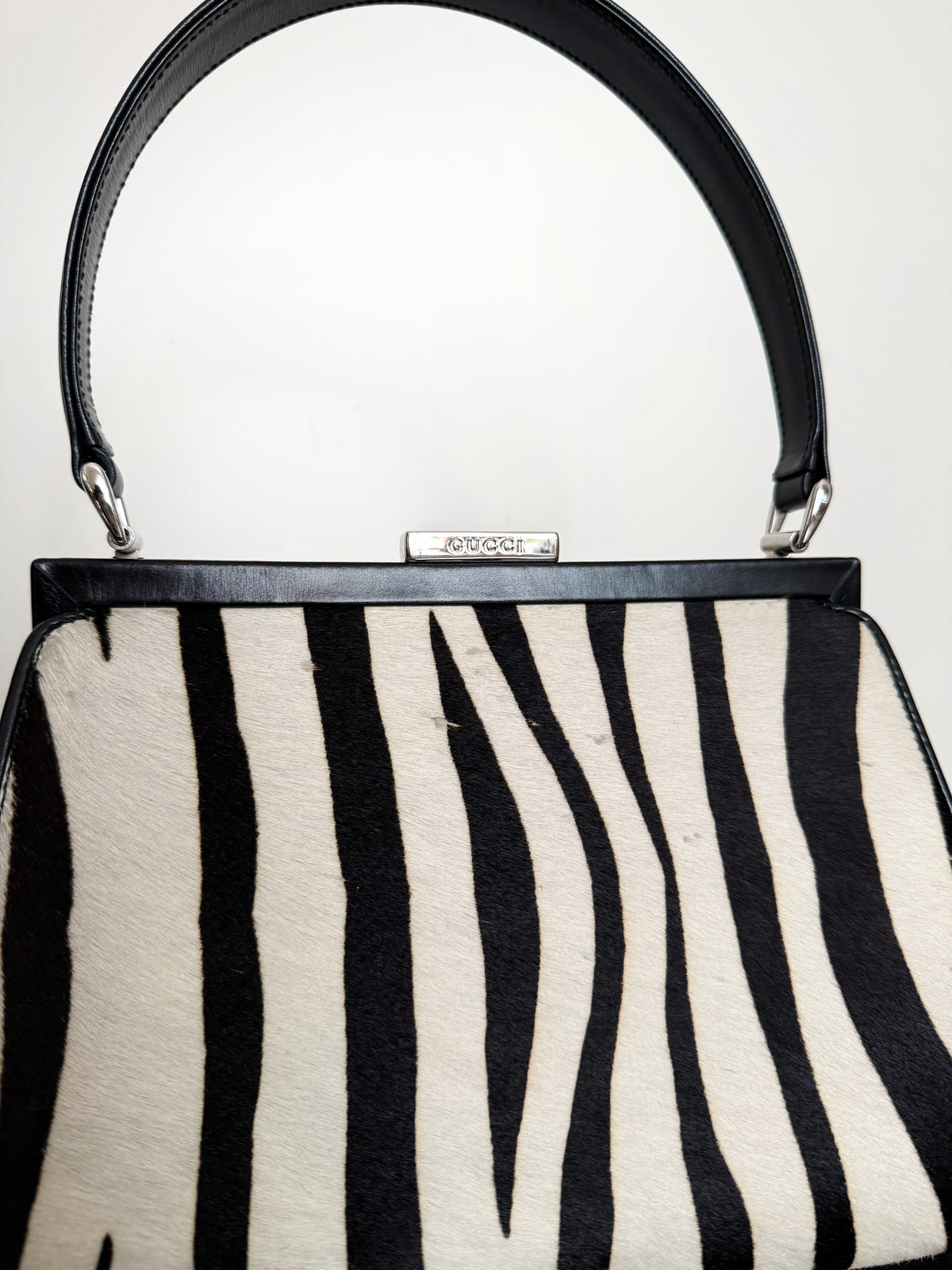 03. Gucci calf pony hair zebra print top handle bag