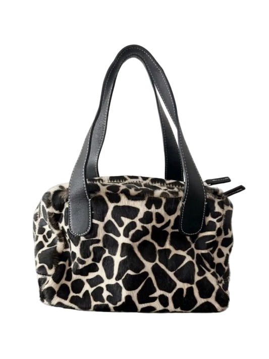 03. Guia’s giraffe print pony hair bowling bag