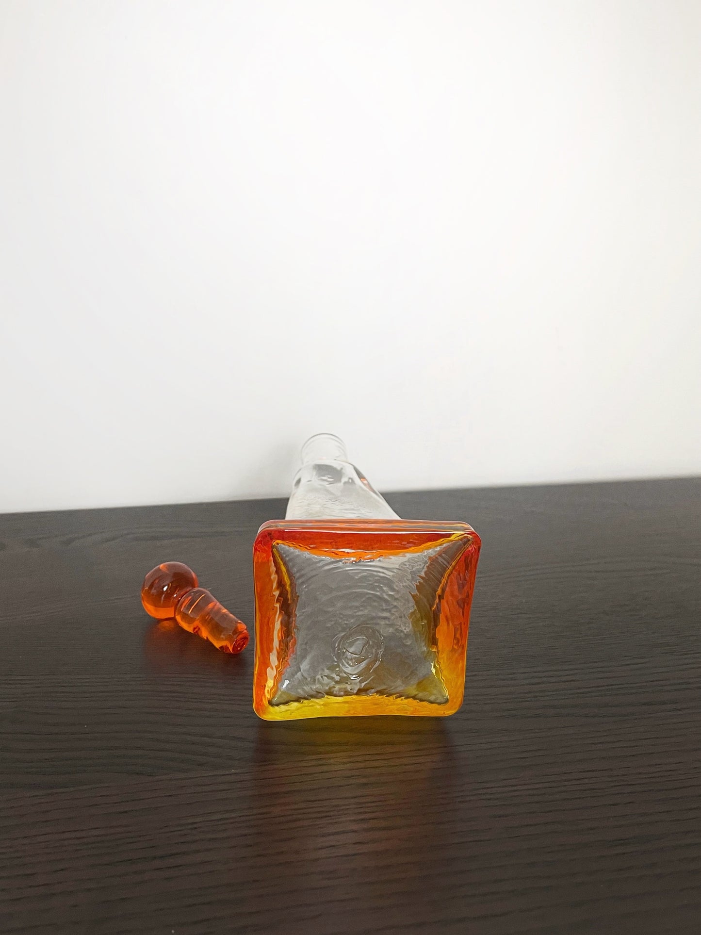 Irregular shaped glass decanter with stopper