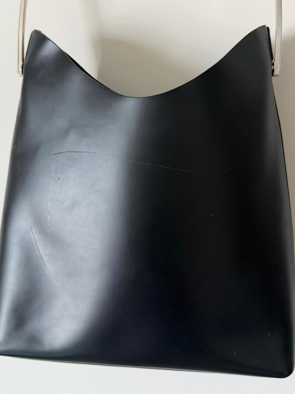 03. Gucci leather bag with metal handle